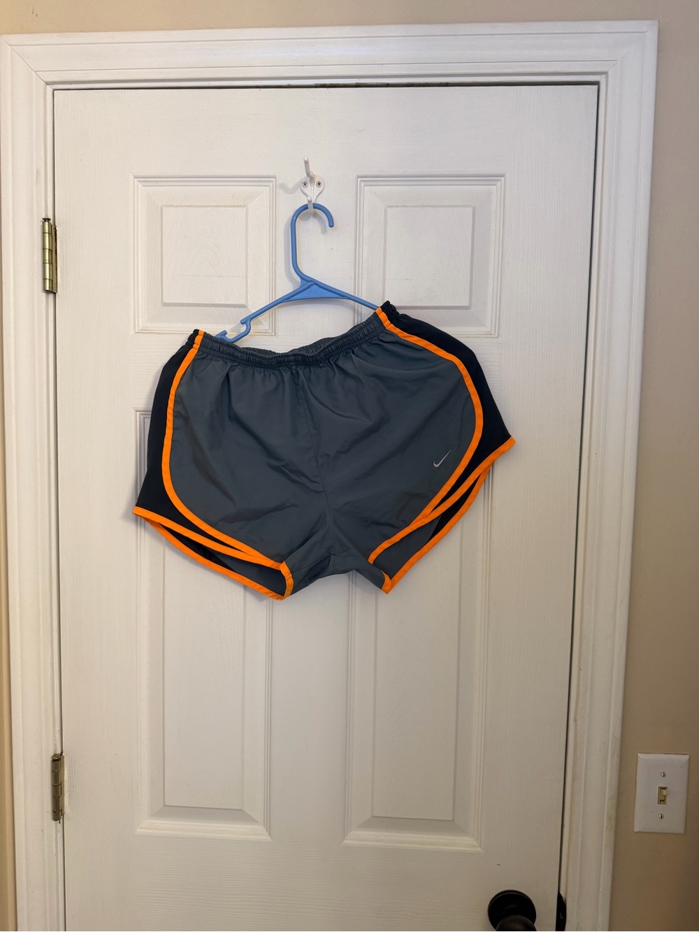 Nike Women's Gray Athletic Shorts with Orange Trim